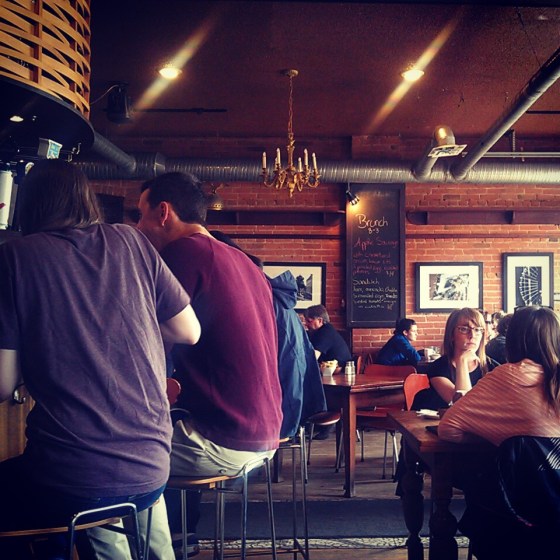 Patrons enjoying their meals and conversations.